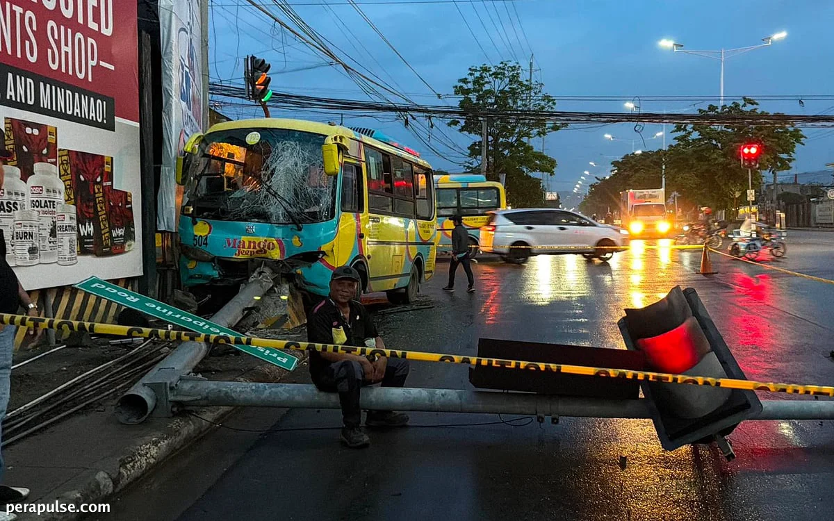 Jeepney Accident in Talisay Injures Two After Crash with Traffic Light Post