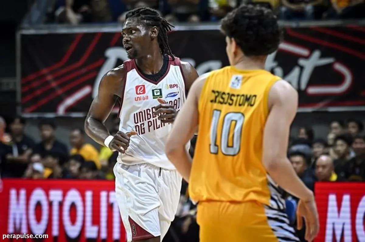 UP Dominates UST in UAAP Showdown with Nnoruka and Remogat's Stellar Play